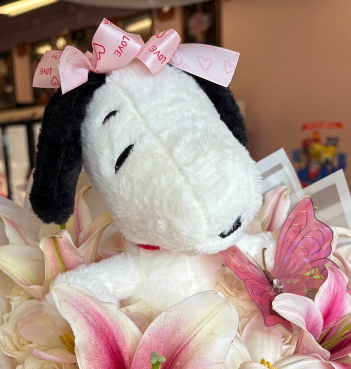 "Snoopy plush with bows"