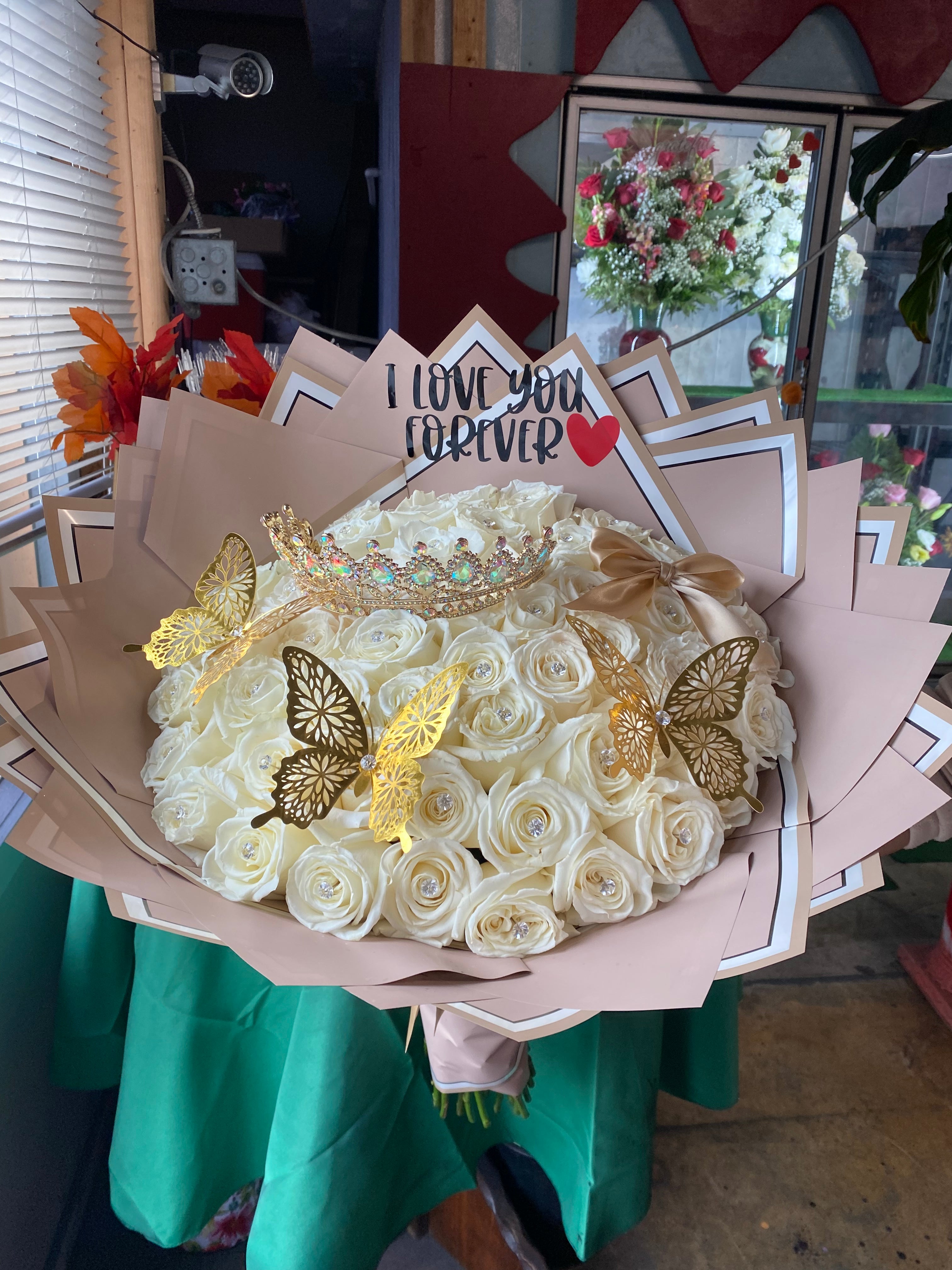50 soft white roses with golden add ons✨